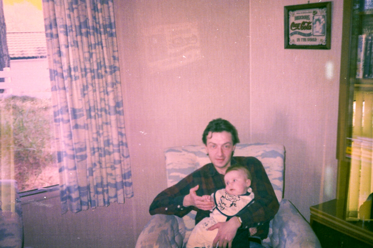 Photos from film found in old cameras - A man holding a baby