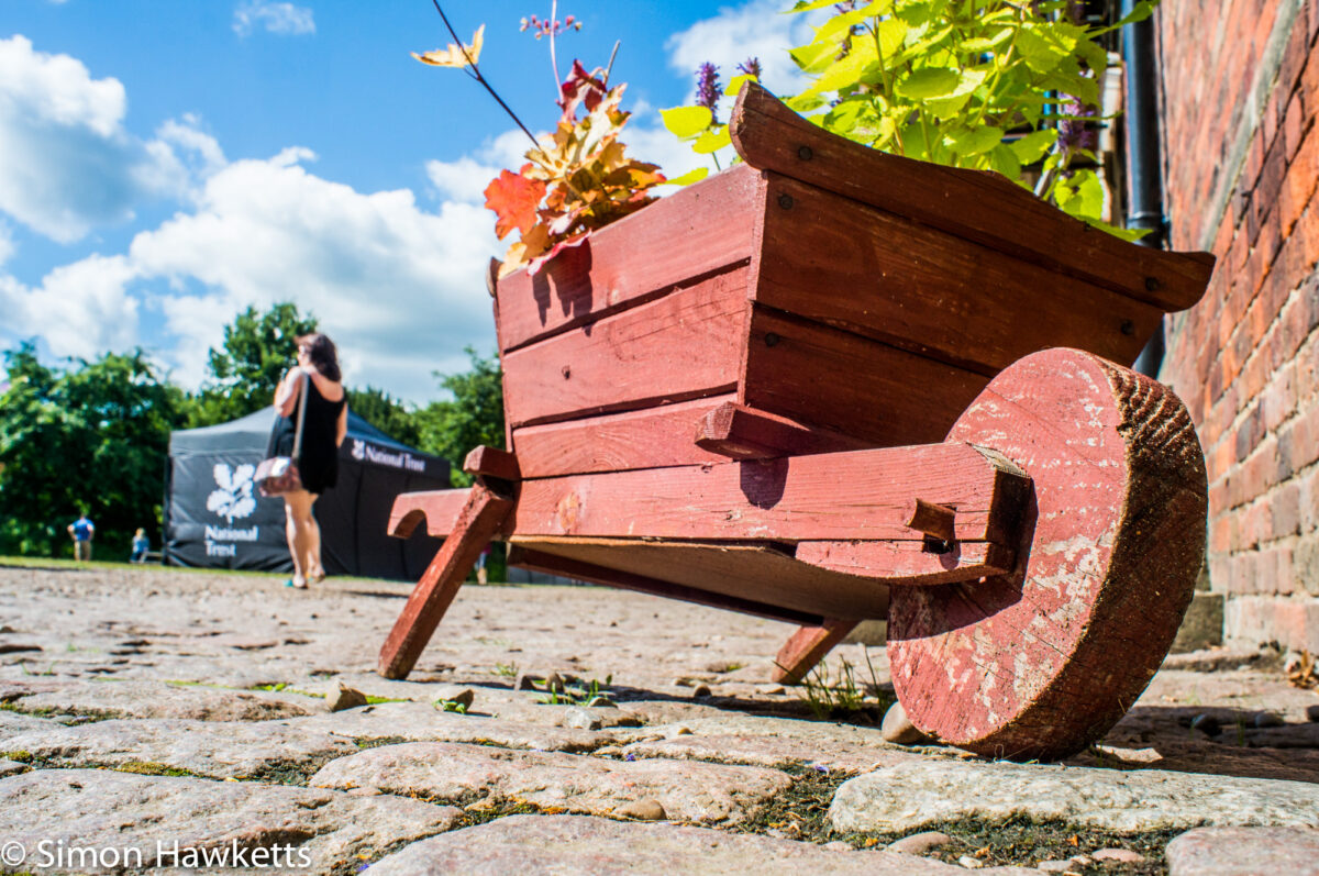 Pictures from Sudbury Hall in Derbyshire - A planter on a cobble stone yard