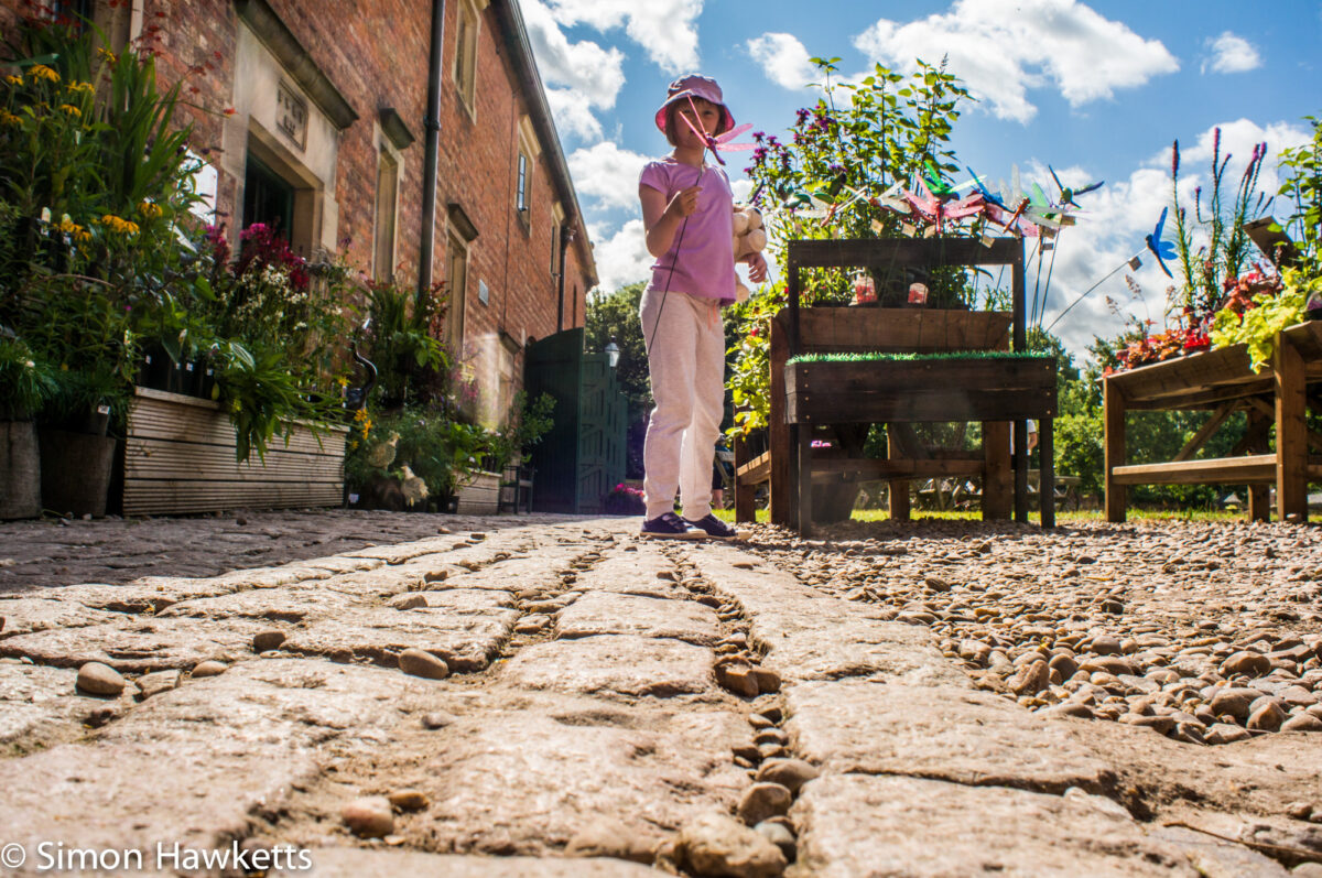 Pictures from Sudbury Hall in Derbyshire - A small girl in distorted perspective