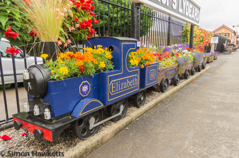 Model train, flower pot