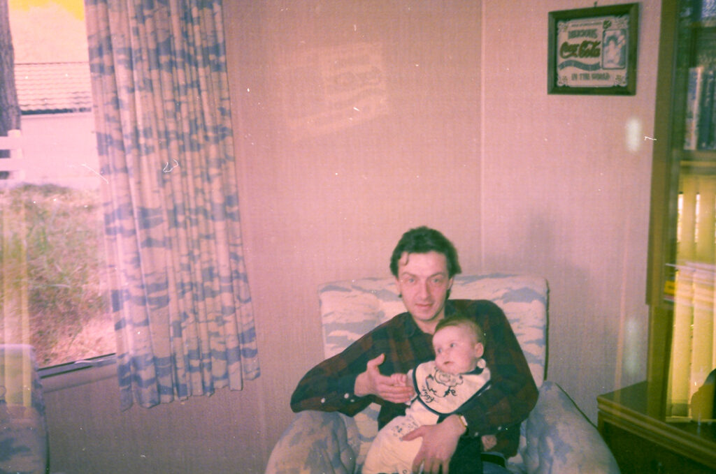 Photos from film found in old cameras - A man holding a baby