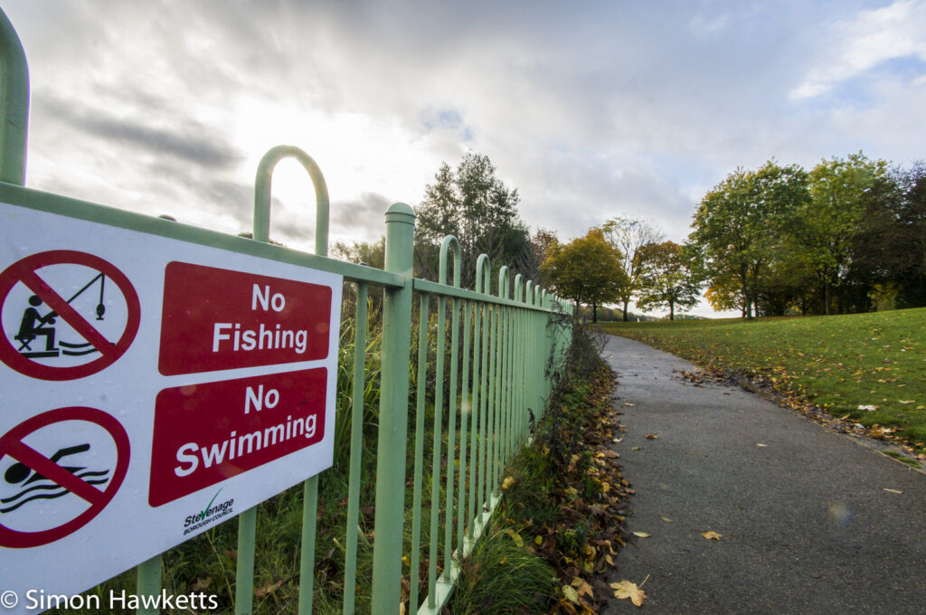 Tamron 10-24 wide angle sample pictures - "Don't fish or swim" notice by the lake in Fairlands Valley Park Stevenage