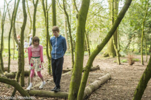 Beningborough Hall pictures - A boy and girl walking and talking in the forest