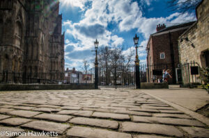 The cobbles stones and gate which leads to York Minster