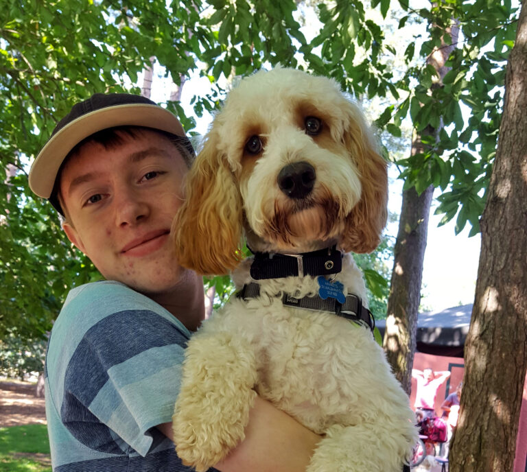 James with Freddy the Cockapoo