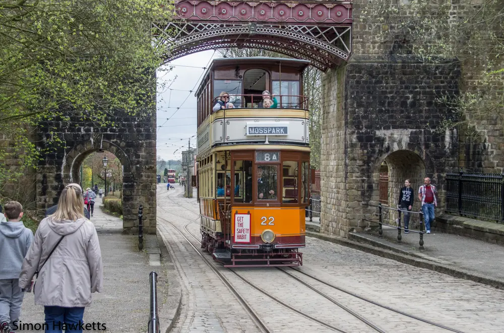 Crich tramway museum - Glasgow co-op passing under the bridge