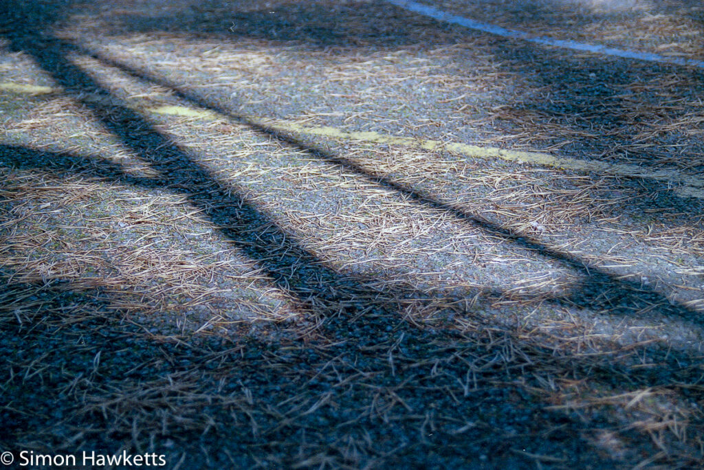 Elveden Forest Centerparcs on film - tennis court shadows