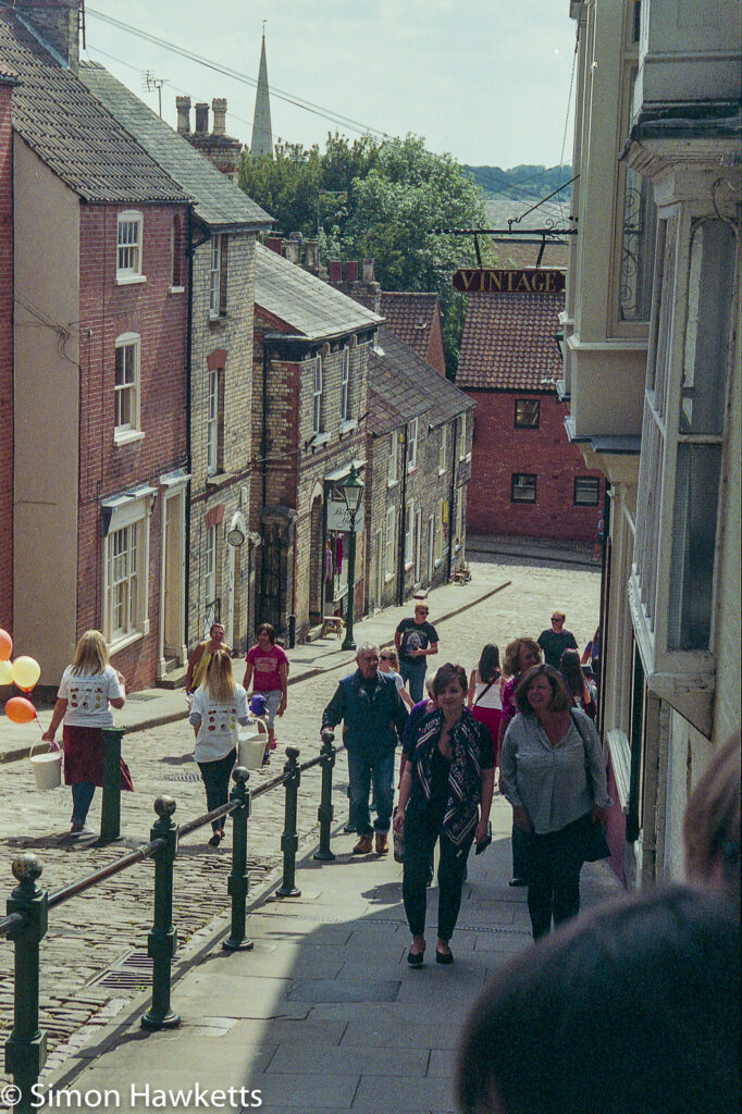 lincoln city on film looking down steep hill