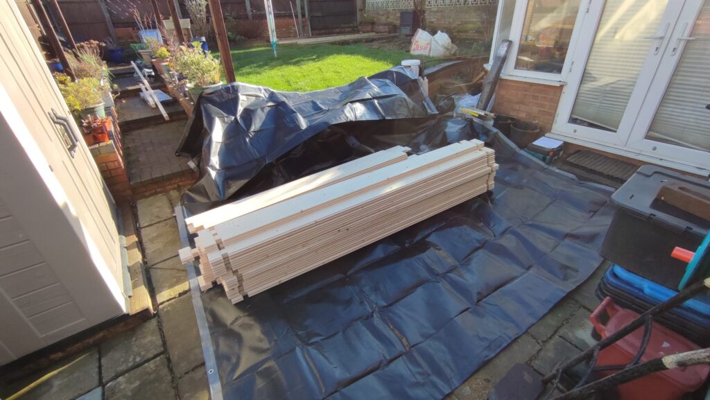 Moving Log cabin kit to back garden
