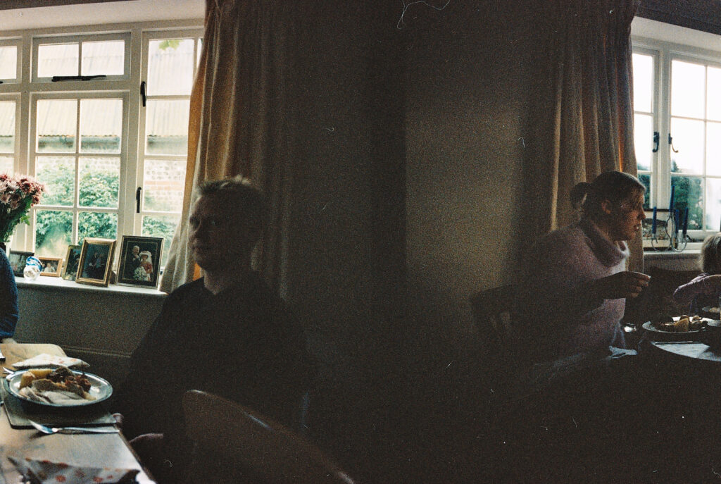 Photos from film found in old cameras - dark interior shop of a family