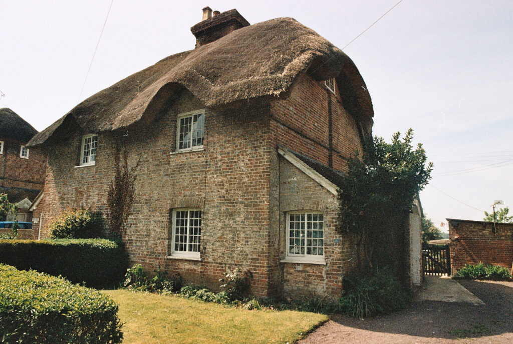 Photos from film found in old cameras - a thatched cottage
