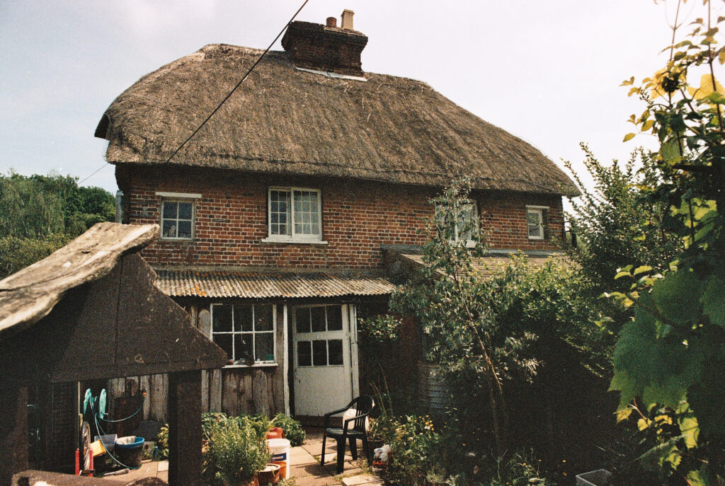 Photos from film found in old cameras - a back garden in a thatched cottage
