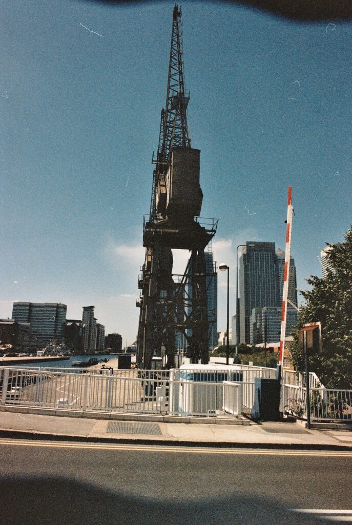 Photos from film found in old cameras - docklands in London showing crane used to unload ships