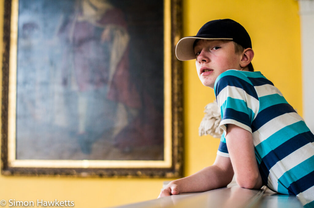 Pictures from Sudbury Hall in Derbyshire - A boy looks over the stairwell