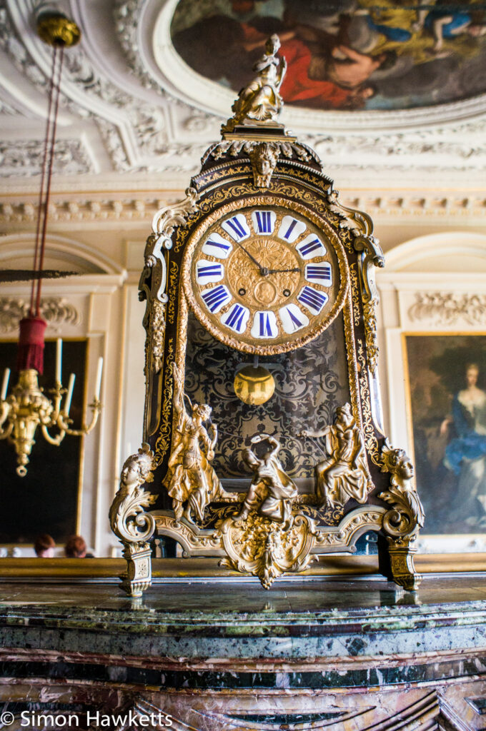 Pictures from Sudbury Hall in Derbyshire - Clock on a mantlepiece in the hall
