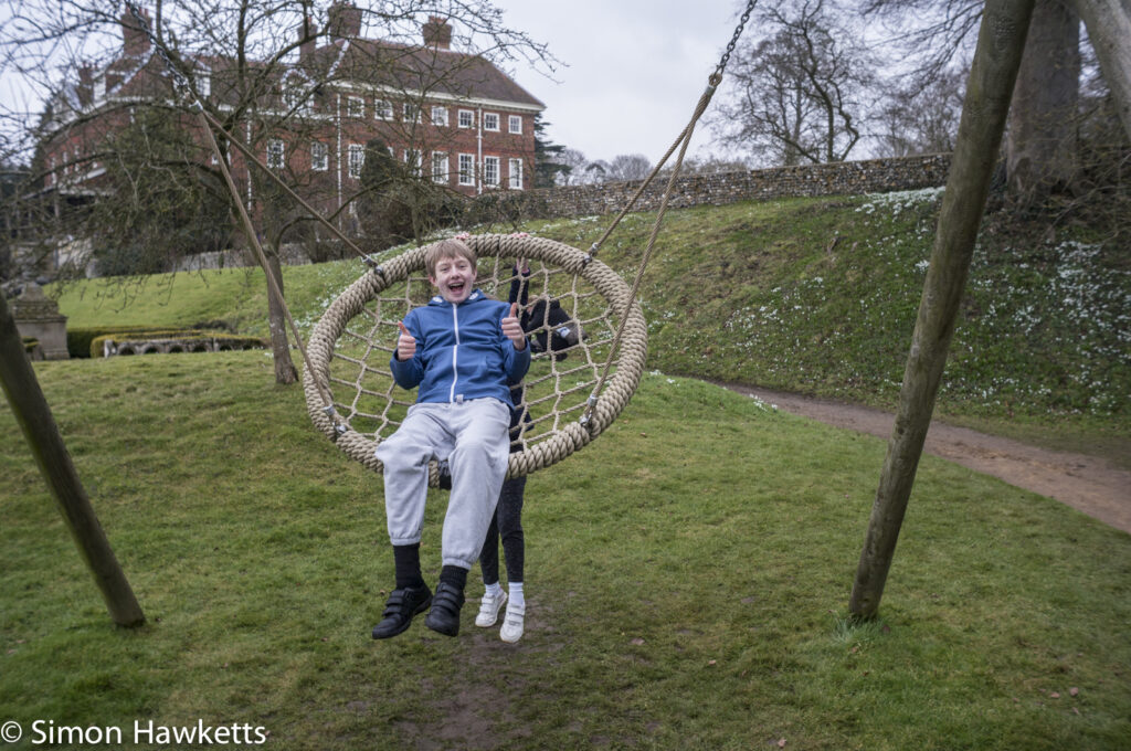 Pictures of Bennington Lordship - A boy has fun on a swing