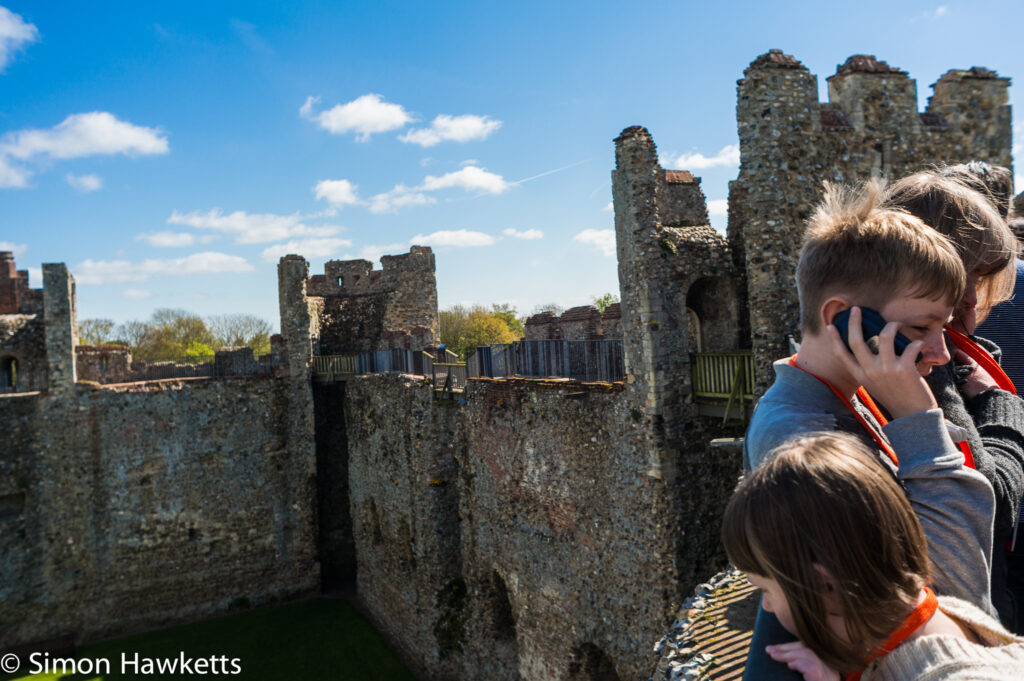 pictures of framlingham in suffolk listening to the comentary on the battlements of framlingham castle